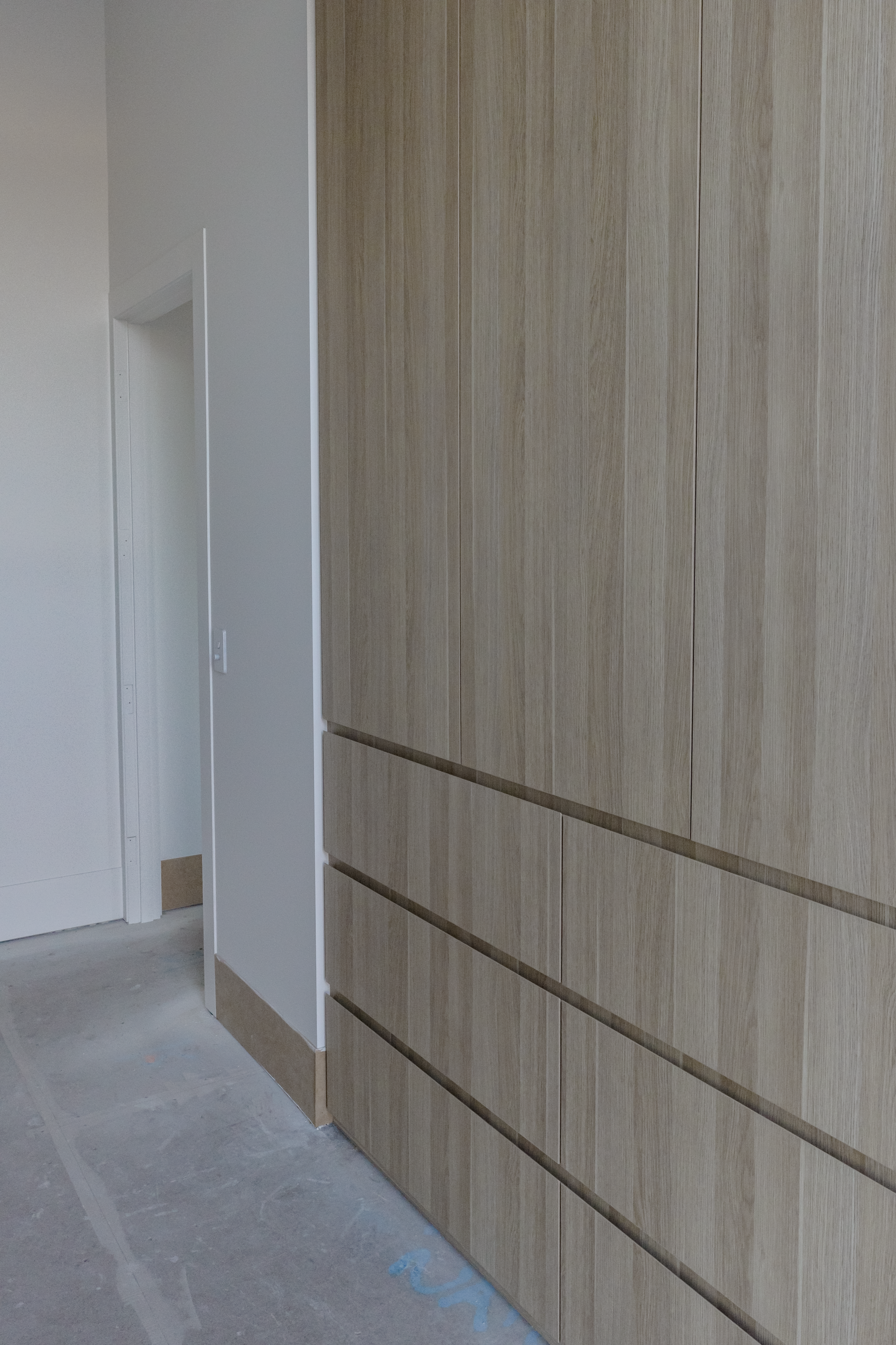 Custom wardrobes installed in a home in Northcote.