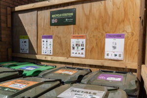 Site recycling station with labelled plastic and material streams on a Passivhaus construction project in Fitzroy, Melbourne.