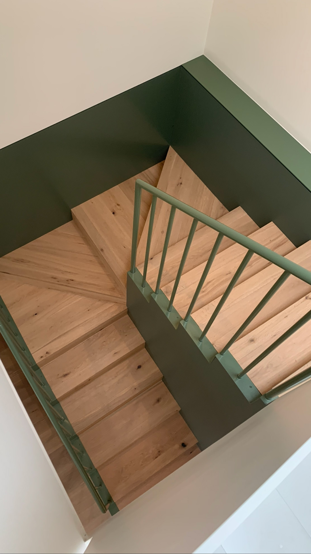 Architectural timber staircase with custom steel balustrade in a Hawthorn home